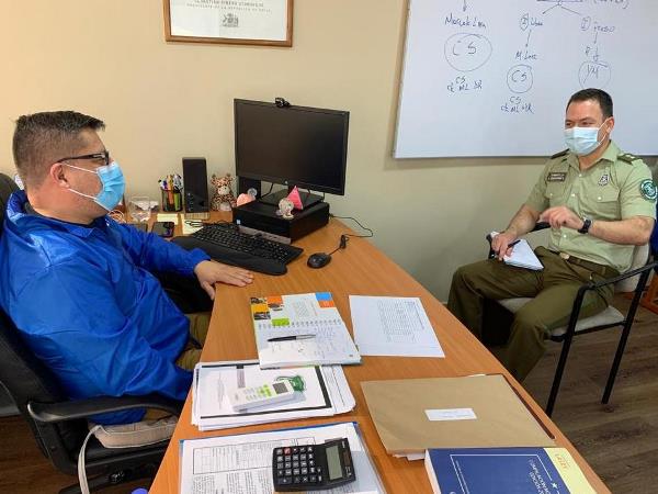 El Defensor Regional y el encargado de Derechos Humanos de Carabineros en Tarapac&aacute;.