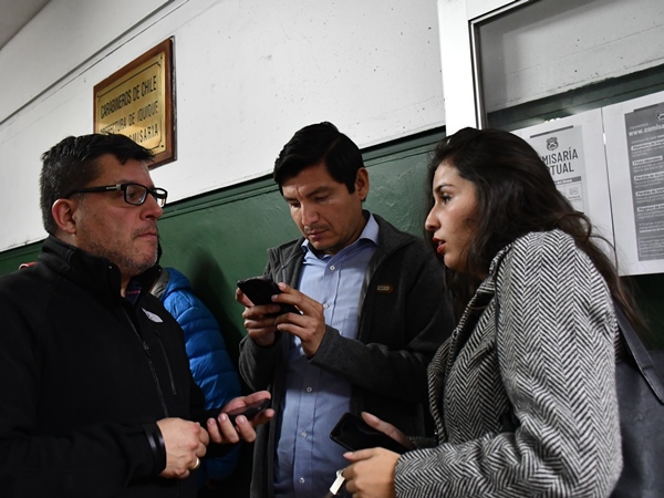 Los defensores penales p&uacute;blicos en la Primera Comisar&iacute;a de Carabineros de Iquique. 