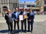 El Defensor Nacional Carlos Mora Jano, durante la premiaci&oacute;n. 