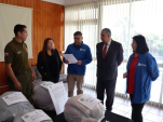 Equipo de la Defensor&iacute;a de Tarapac&aacute; junto a la Unidad Regional de DD. HH. de la 1&ordf; Zona de Carabineros.