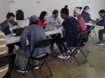El equipo de Defensa de Migrantes en plena acci&oacute;n.