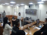 Al centro aparece el defensor Andr&eacute;s Hidalgo, entre los intervinientes en el primer juicio oral semipresencial.