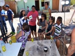 Funcionarios de la Defensor&iacute;a Regional de Tarapac&aacute; difundiendo derechos en medio de la vida comunitaria del pueblo de Huarasi&ntilde;a.