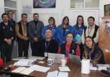 Las defensoras penitenciarias con el director y profesores del colegio de la unidad penal y personal de Gendarmeria.  