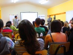 Defensores penales p&uacute;blicos exponiendo en la charla especialiazada de Extranjeros y Migrantes en Arica
