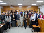 El defensor regional junto a los participanes en la jornada de juicios simulados 2026.