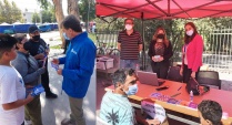 DRMN informa a vecinos de Quilicura de sus derechos. Alcaldesa Paulina Bobadilla con defensores RPA Gonzalo Charm&iacute;n y Patricia Cisternas.