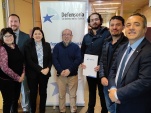 Profesioanles de la Defensor&iacute;a y dirigentes del Movihl fueron parte de la breve ceremonia
